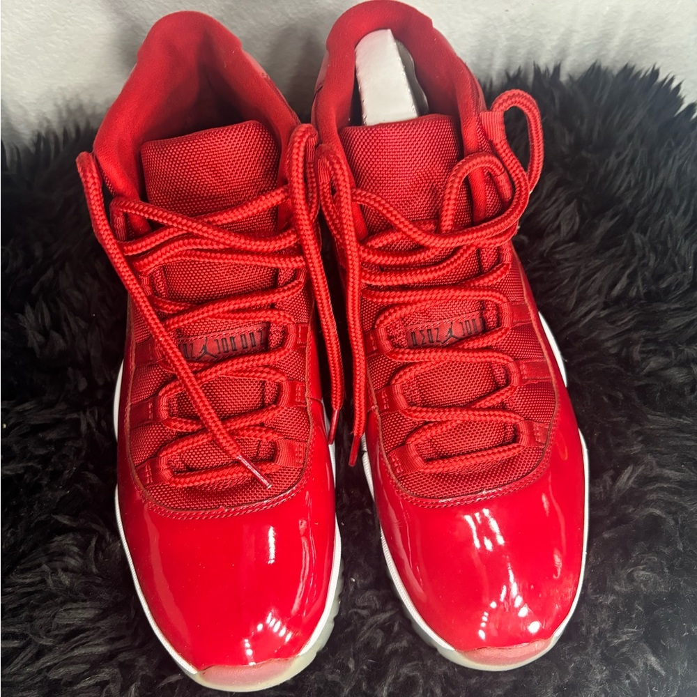 Air Jordan 11 Retro Red Sneakers with High-Top Design and Glossy Finish